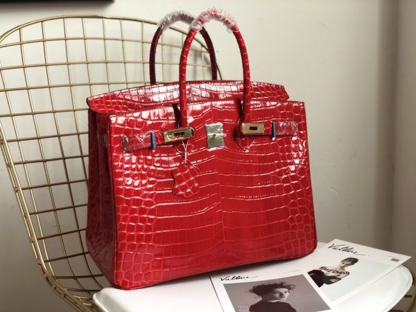 H A SHINY SANGUINE POROSUS CROCODILE BIRKIN 30 WITH GOLD HARDWARE RED 30CM