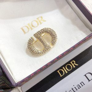 DIOR CD BROOCH GOLD WITH STONES ATTACHED