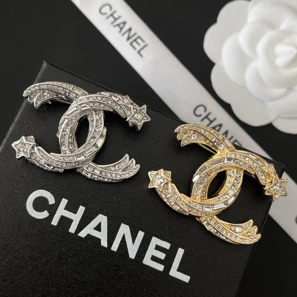 CHANEL CC BROOCH SILVER WITH STONES ATTACHED AND TWO STARS