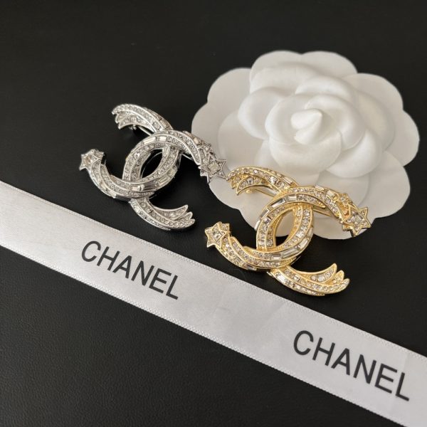 CHANEL CC BROOCH SILVER WITH STONES ATTACHED AND TWO STARS