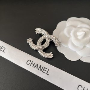 CHANEL CC BROOCH SILVER WITH STONES ATTACHED AND TWO STARS