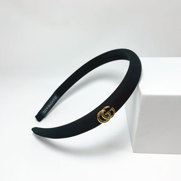 GUCCI SMALL GG HEADBAND WITH GOLD HARDWARE IN BLACK