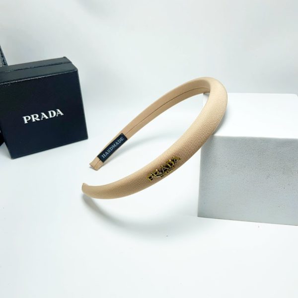 PRADA SMALL PRADA MILANO HEADBAND WITH GOLD HARDWARE IN BEIGE