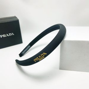 PRADA SMALL PRADA MILANO HEADBAND WITH GOLD HARDWARE IN BLACK