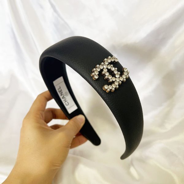 CHANEL CC LEATHER HEADBAND WITH GOLD HARDWARE IN BLACK