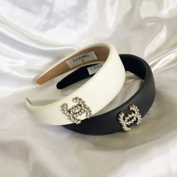 CHANEL CC LEATHER HEADBAND WITH GOLD HARDWARE IN BLACK