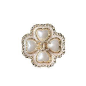 CHANEL CC FLOWER BROOCH GOLD WITH PEARL HEART