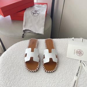 HERMÈS ORAN SANDALS STITCHING IN BROWN AND WHITE