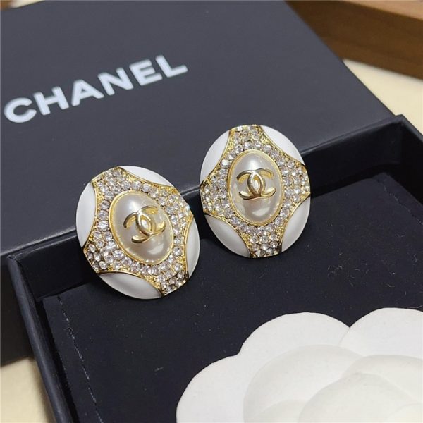 CHANEL OVAL CRYSTAL EARRINGS IN GOLD