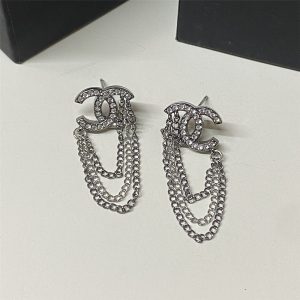 CHANEL STUD EARRINGS WITH CRYSTAL AND MULTI CHAIN IN SILVER TONE