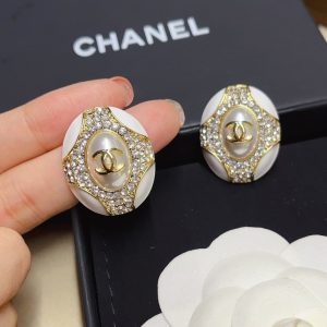 CHANEL OVAL CRYSTAL EARRINGS IN GOLD