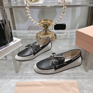 MIUMIU CANVAS AND BLEACHED LEATHER BOAT SHOES BLACK