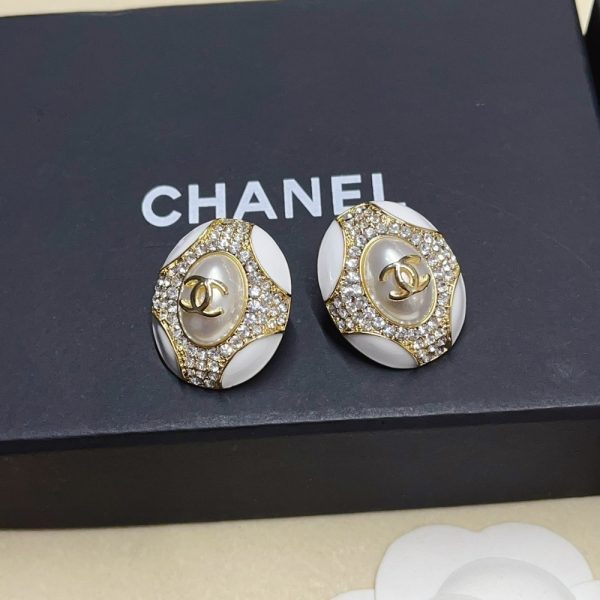 CHANEL OVAL CRYSTAL EARRINGS IN GOLD