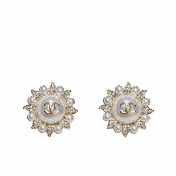 CHANEL SUNBURST PEARL AND CRYSTAL EARRINGS IN GOLD TONE